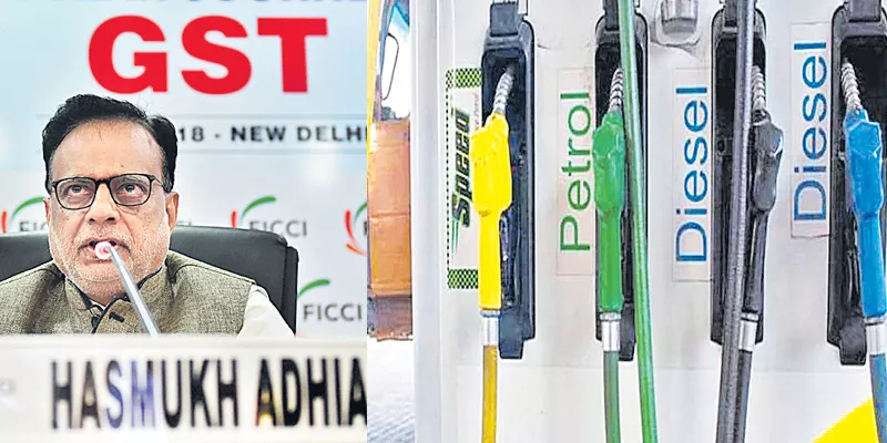 Petroleum products to be brought under GST in stages: Hasmukh Adhia - Sakshi