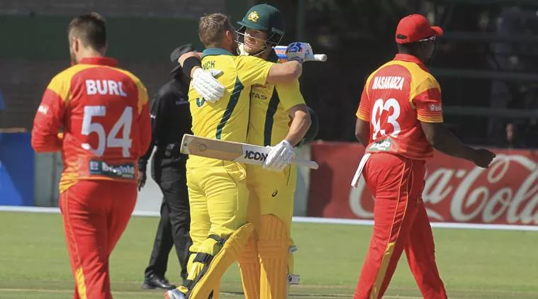 Australia beat Zimbabwe by 5 wickets - Sakshi