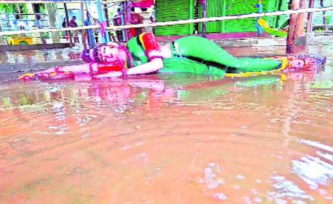 Sitamma Statue In the Rain Water - Sakshi