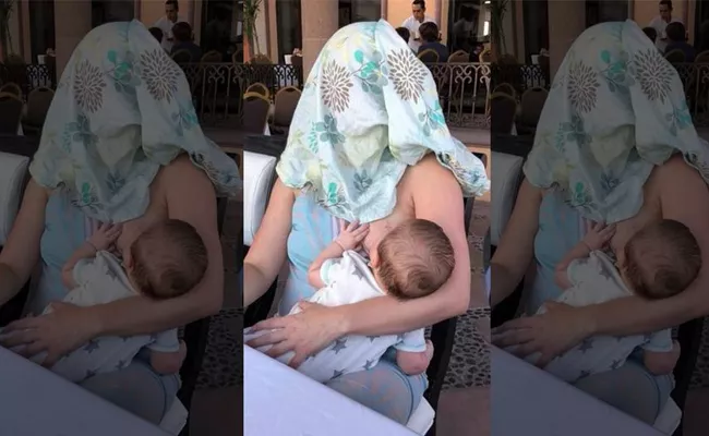 Mexican Mother Cover Her Face Whole Breastfeeding Photo Viral - Sakshi