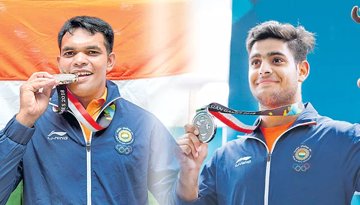 Asian Games 2018: Shooter Deepak Kumar and lakshay wins air rifle silver - Sakshi