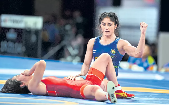  Wrestler Vinesh Phogat wins gold in Asian Games - Sakshi