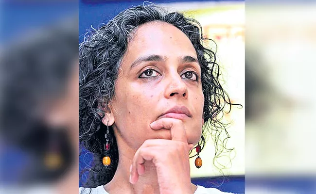 arundhati roy comments on kerala floods - Sakshi