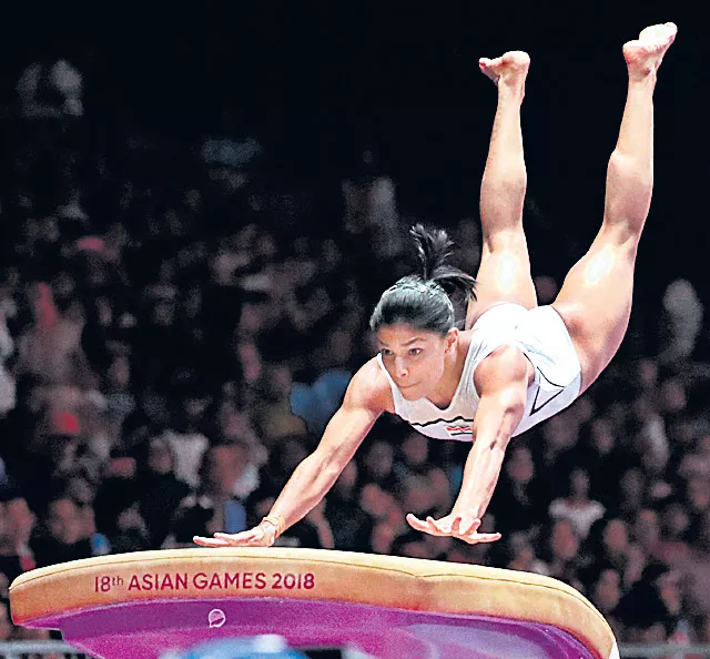 Aruna Budda Reddy became the first Indian gymnast - Sakshi