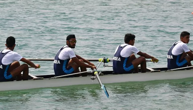 India clinch gold medal in the mens quadruple sculls team event - Sakshi