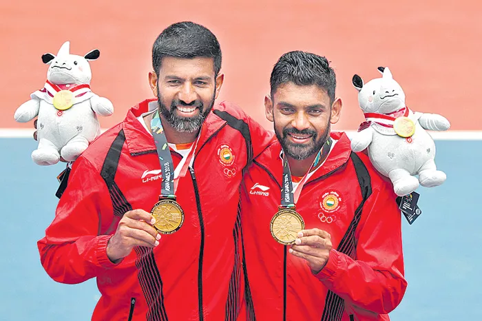 Asian Games 2018: Gold medal for Rohan Bopanna-Divij Sharan - Sakshi