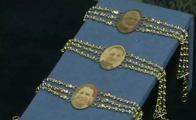 Gold Rakhis With Faces Of PM Modi And Yogi Adityanath - Sakshi