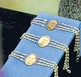 Gold Rakhis At Rs. 50000 With PM Modi And Yogi - Sakshi