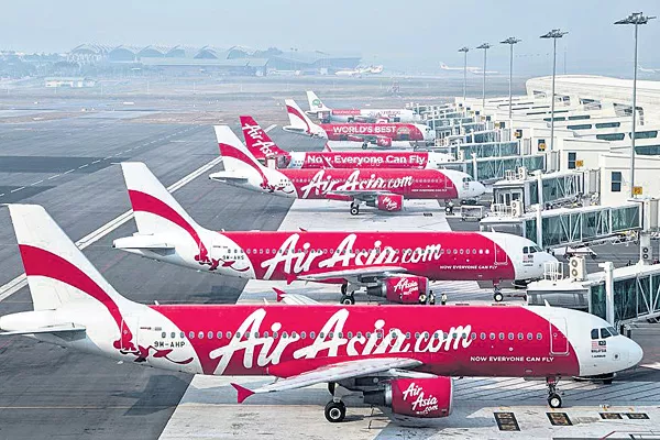 AirAsia offers discounts: Domestic flights start at Rs 1199 - Sakshi