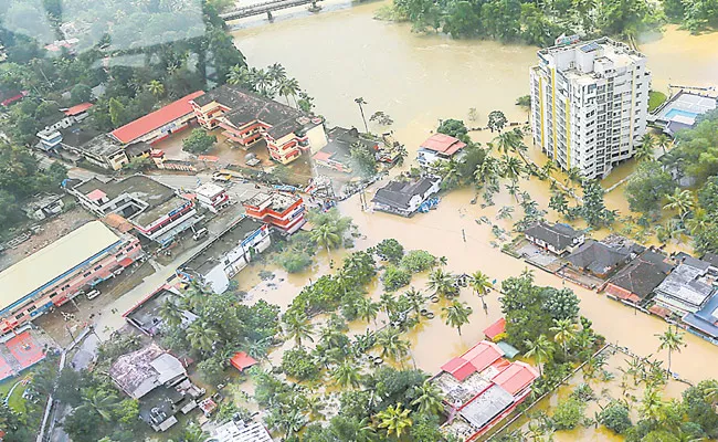 Politics On Kerala Floods - Sakshi