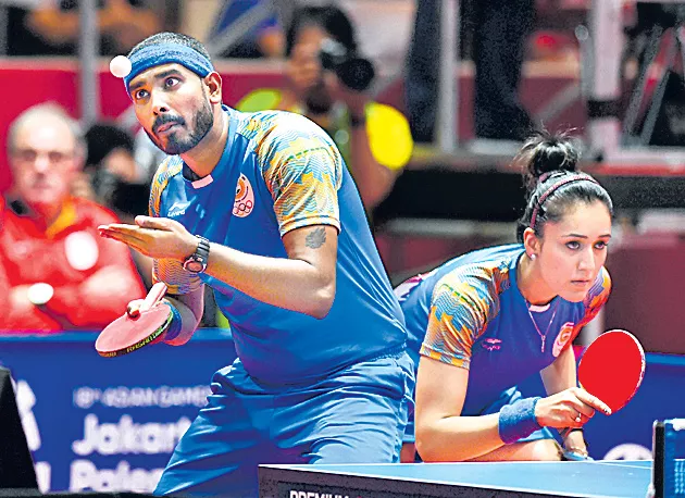  Bronze for Sharath-Manika in table tennis - Sakshi