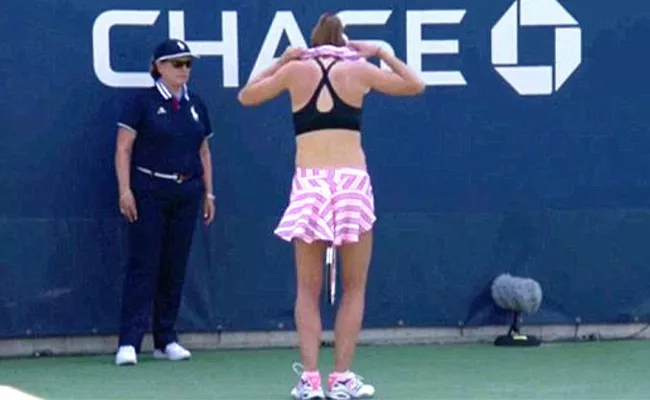 Alize Cornet given warning for removing shirt on court - Sakshi