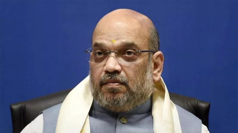 Amit Shah Dares Congress To Clear Stand On OBC Bill - Sakshi