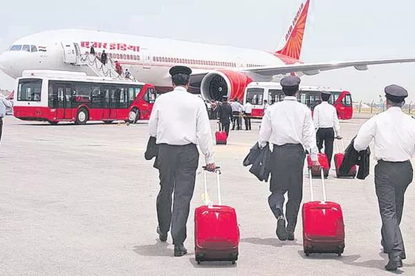 Civil Aviation Min mulls Rs 11000 cr bailout package for Air India - Sakshi