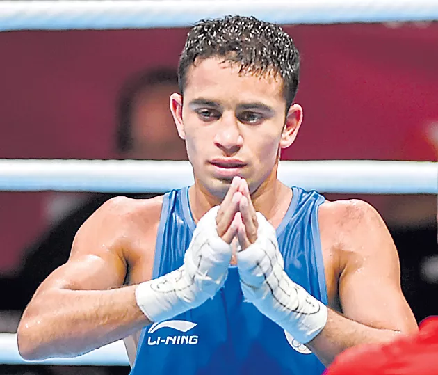 Indian boxer Amit Bhagal - Sakshi