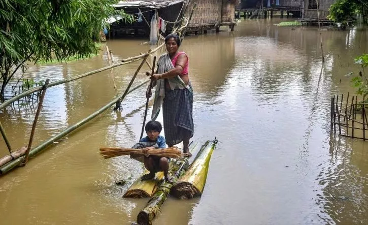 Arunachal, Assam, flood warnings, floods - Sakshi