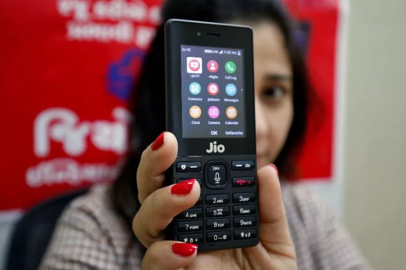 Whatsapp Arrives On Jio  Phone Record sales - Sakshi