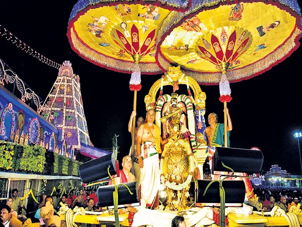 Tirumala Brahmotsavas begins grandly - Sakshi