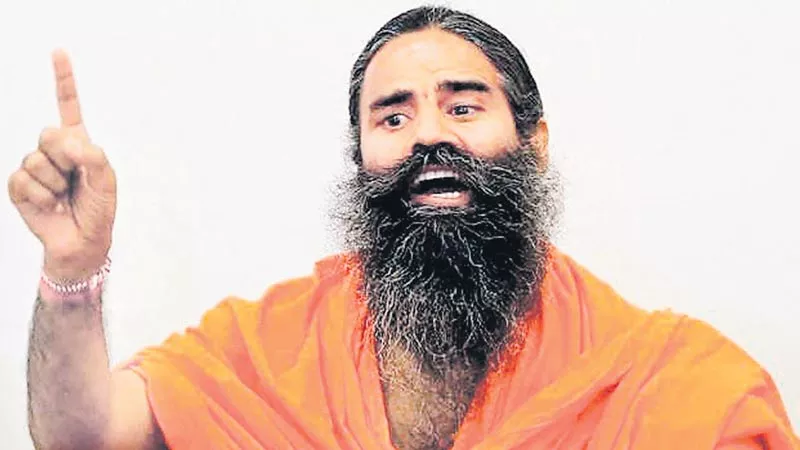 Baba Ramdev says fuel price rise will cost government dearly - Sakshi