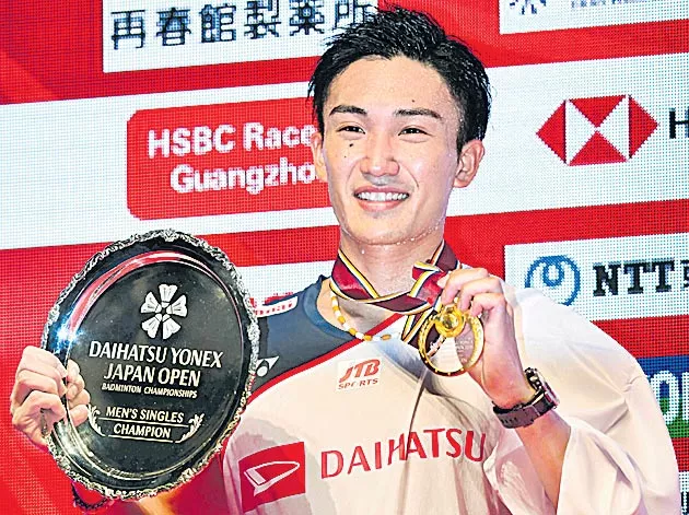 Momota wins Japan badminton title - Sakshi