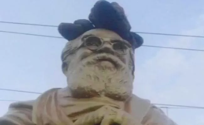 Periyar Statue Damaged Slippers Kept On head - Sakshi