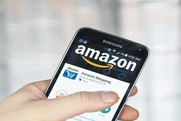 Amazon To Sell Insurance In India - Sakshi