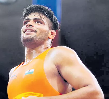 Indian boxer win a silver medal - Sakshi