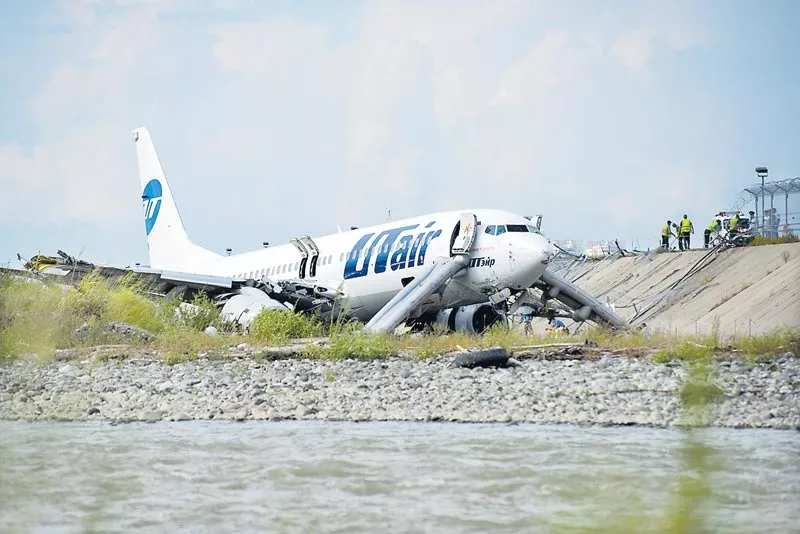 Russian plane crashes off runway in Sochi - Sakshi