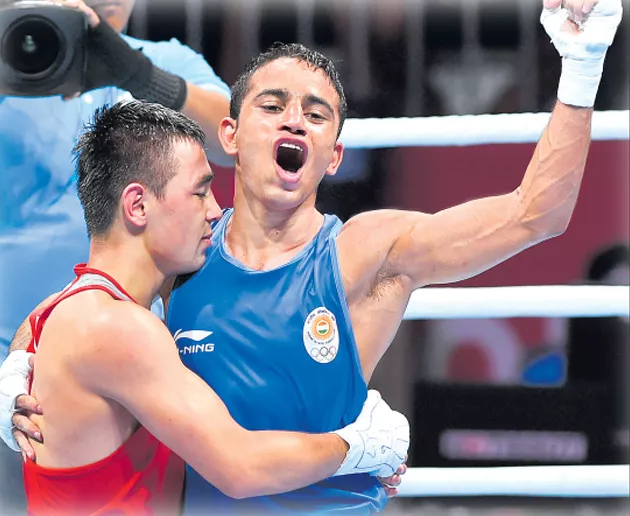  Asian Games 2018: Amit Panghal bags gold in mens boxing - Sakshi