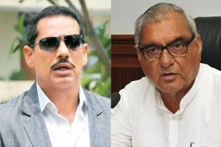 Robert Vadra, Bhupinder Singh Hooda booked for land scam - Sakshi