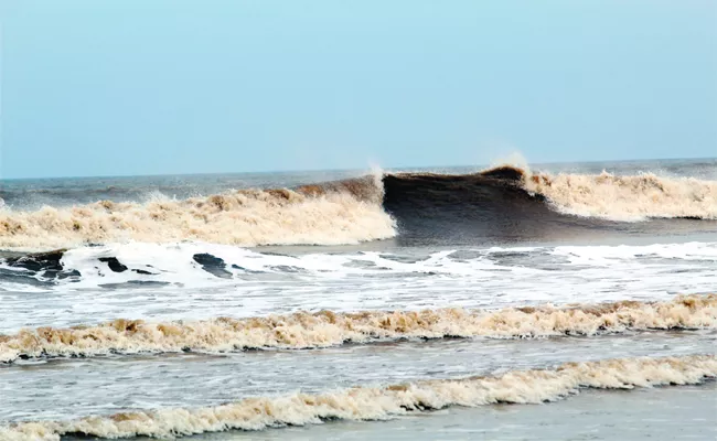 Waves Cut Beach In Krishna - Sakshi