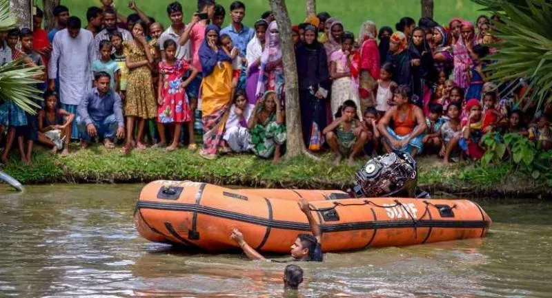 Dangling Live High-Voltage Wire Touches Pond in Assam - Sakshi