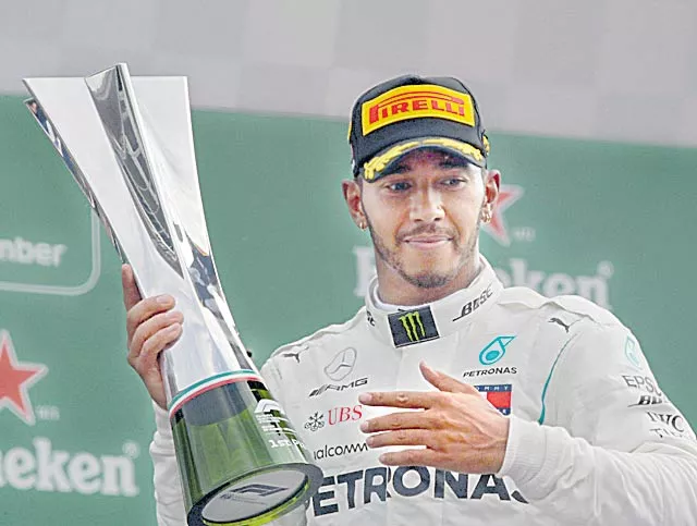 Lewis Hamilton wins frantic race at Monza as Mercedes outsmart Ferrari on their home turf - Sakshi