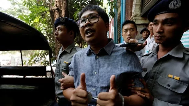 Reuters reporters sentenced to seven years in a Myanmar prison - Sakshi