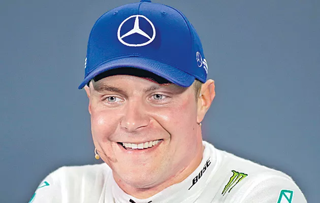  Bottas takes pole over Hamilton at Russian GP - Sakshi