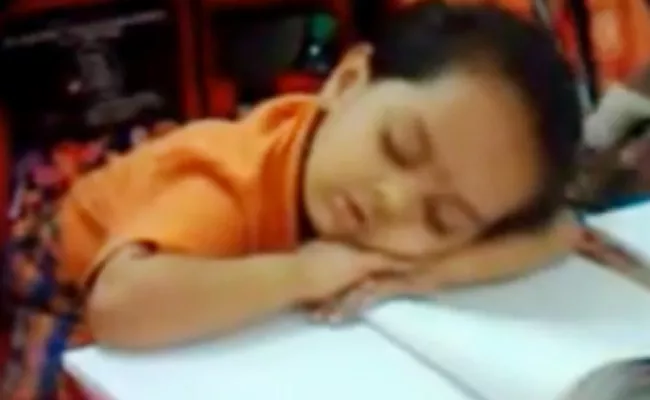 Kid Sleeping In Classroom Cute Video Goes Viral - Sakshi