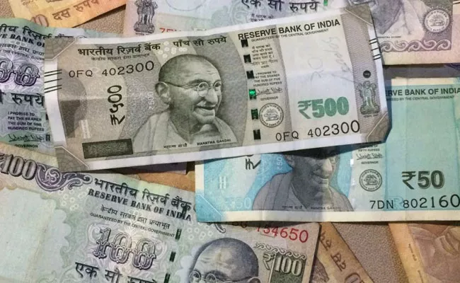 Indian rupee opens higher at 71.40 per dollar - Sakshi