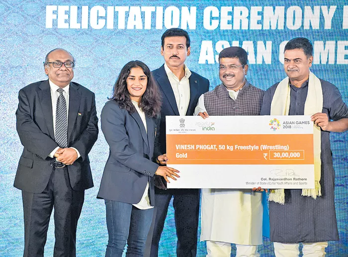 Special Honor of the Asian games winners - Sakshi