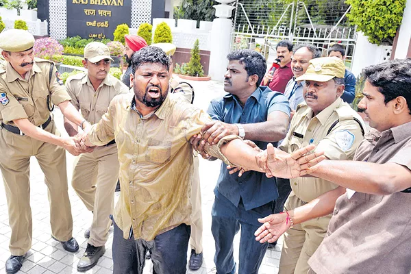 Young man's suicide attempt before Raj Bhavan - Sakshi