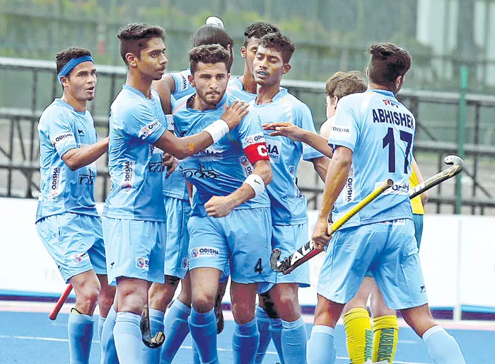 India beat Australia in Sultan of Johor Cup, seal semifinal spot - Sakshi