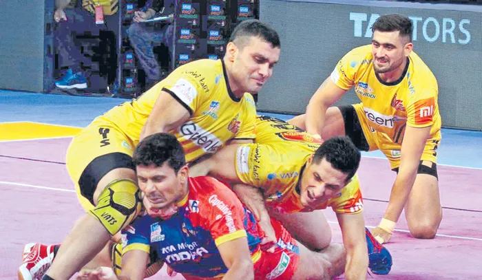 Telugu Titans beat UP Yoddha  - Sakshi