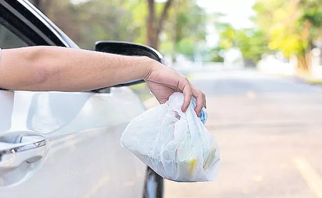 Biker Teach A Lesson To A Woman Who Throws Garbage On Road In China - Sakshi