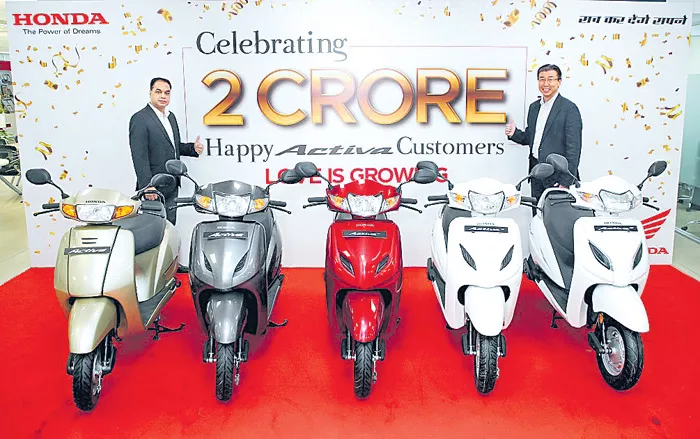 Honda Activa crosses 2 crore volume mark - Sakshi