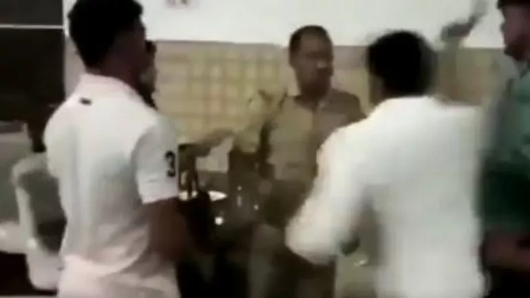 Uttar Pradesh BJP Councillor Thrashes A Sub-Inspector - Sakshi