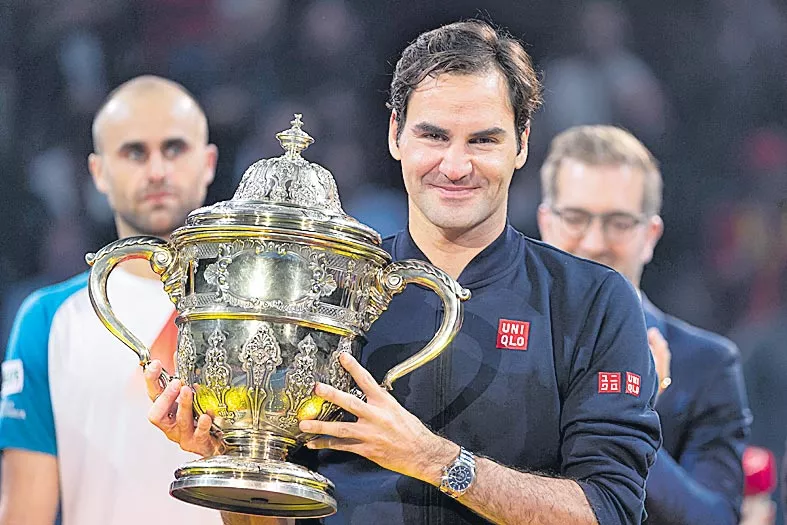 Federer wins 99th title, beats Copil in Swiss Indoors final - Sakshi