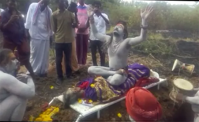 Aghori Tantrik Pooja By Sitting On His Mother Dead Body - Sakshi