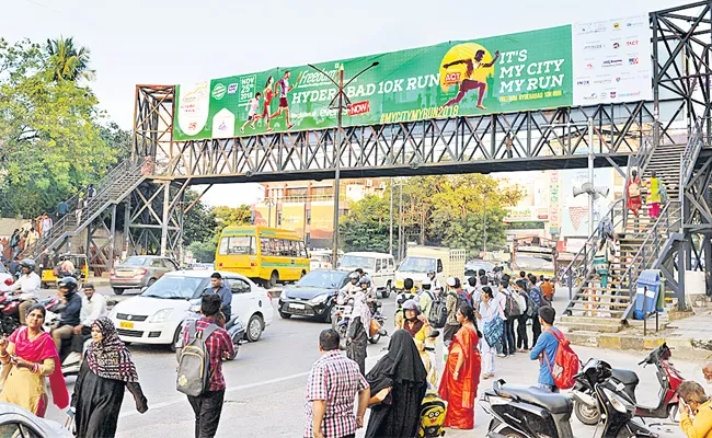 Contractors Helpless In Sky Ways And FOBs in Hyderabad - Sakshi