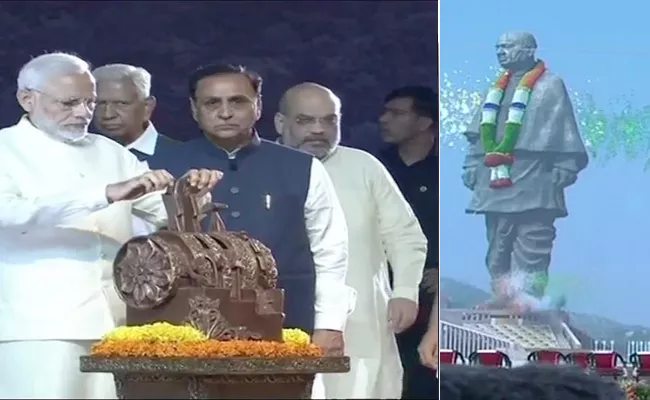 PM Narendra Modi Inaugurated Sardar Patel Statue Of Unity At Sardar Sarovar Dam - Sakshi