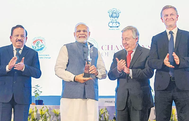 PM Narendra Modi receives UN's Champions of the Earth award - Sakshi