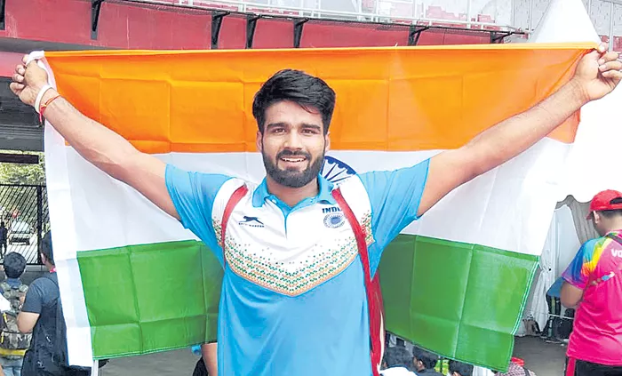 India scoop 11 medals with three gold, Sandeep smashes world record - Sakshi